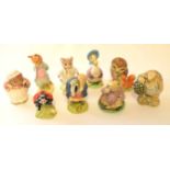 Group of Beswick ware figures, some from the Beatrix Potter series including Old Mr Brown and a foxy