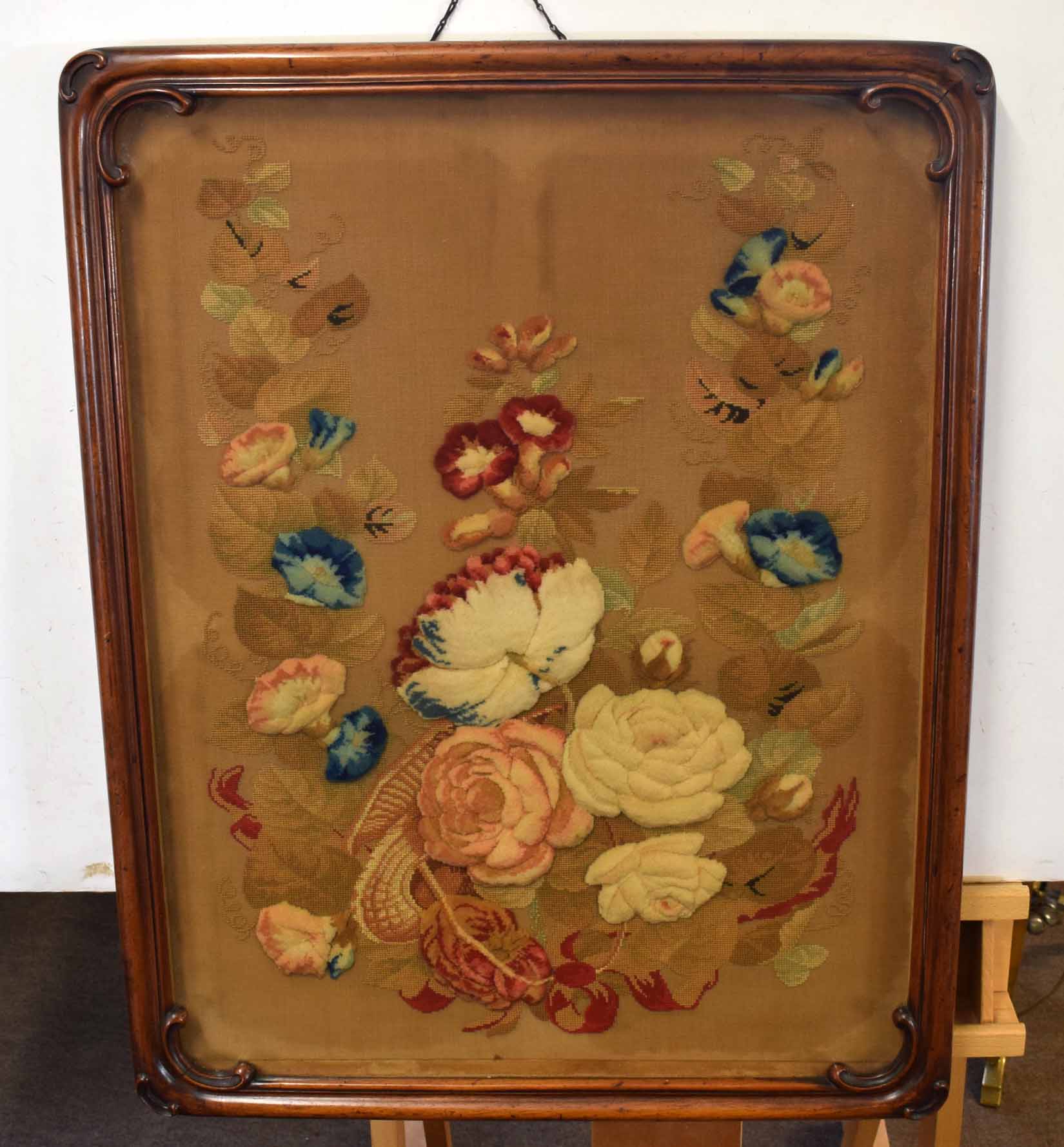 19th century mahogany framed and glazed stumpwork picture depicting foliage etc, 64cm wide