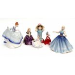 Group of Royal Doulton figurines including "Affection", a small version of "Christmas Morn"