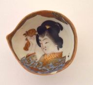 Unusual Japanese porcelain miniature bowl, the interior modelled with a geisha