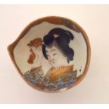 Unusual Japanese porcelain miniature bowl, the interior modelled with a geisha