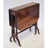 Victorian mahogany and simulated rosewood Sutherland table, two drop flaps with canted corners, ring