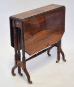 Victorian mahogany and simulated rosewood Sutherland table, two drop flaps with canted corners, ring