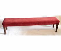 Victorian rosewood simulated window seat or bench, of rectangular form with red upholstered seat and