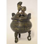 Oriental metal ware Koro and cover, bronzed effect, the cover with a reticulated design and dragon
