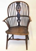 19th century stick back Windsor armchair with wheel splat and with solid seat