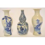 Pair of Chinese porcelain vases, probably late 19th century, decorated with Chinese figures in a