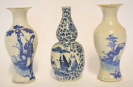 Pair of Chinese porcelain vases, probably late 19th century, decorated with Chinese figures in a