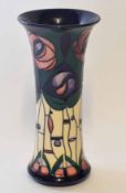 Modern Moorcroft vase, signed to base with a scrolling tube lined design of flowers and plants, 25cm