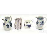Group of four jugs, three with blue and white designs including an 18th century Worcester coffee pot