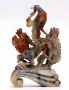 Chinese soapstone carving of a dragon with eagle type bird on its back, the dragon and bird picked