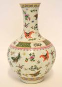Chinese porcelain vase, the large cylindrical body decorated in polychrome with moths and