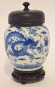 Ching dynasty porcelain vase, probably 19th century, decorated in underglaze blue with a sinuous