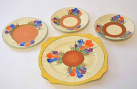 Group of Clarice Cliff wares decorated with the Crocus pattern comprising a large plate with