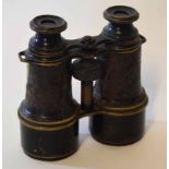 Pair of early 20th century patinated brass binoculars of typical form with screw adjustment, MK V