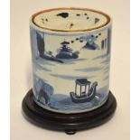 Chinese porcelain cylindrical jar and cover, the body decorated with a sampan in a river setting,