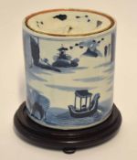 Chinese porcelain cylindrical jar and cover, the body decorated with a sampan in a river setting,