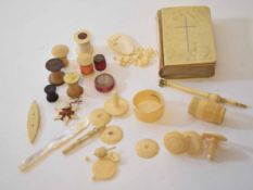 Mixed Lot: various sewing related bobbins, thread holders and winders together with a dip pen