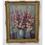 T H Bruce, signed oil on board, Still Life study of mixed flowers in a vase, 50 x 36cm