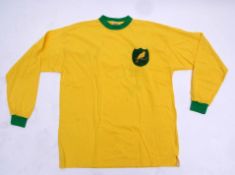 Norwich City F C replica shirt, signed at a reunion dinner by Bruce Rioch, Nigel Worthington, Ron