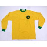 Norwich City F C replica shirt, signed at a reunion dinner by Bruce Rioch, Nigel Worthington, Ron