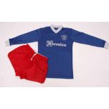 Retro Queen of the South football club shirt with red shorts