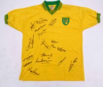 Norwich City F C shirt, signed by players and managers, including Mike Walker, Martin Peters,