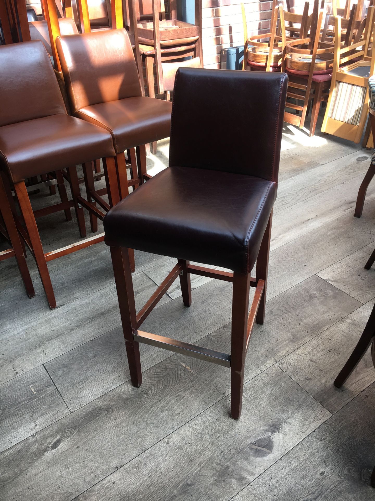 Upholstered high Bar Chair, in dark tan, approx height 76cm.