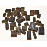 Box containing 30+ small wooden and metal printing blocks (qty)