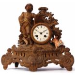 Late 19th century French gilt spelter figural mantel clock, the drum case flanked by a scholar