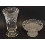 Frosted glass tazza with cut glass border together with a cut glass vase on pedestal foot, the