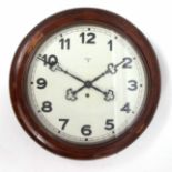 Early 20th century walnut cased dial timepiece, the sectioned and moulded surround to a spun brass