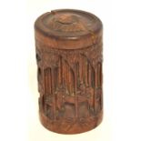 Carved bamboo brush pot and cover, carved with scenes of two figures to the front, 17cm high