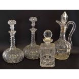 Group of three heavy cut glass decanters, one of square shape with diamond cut and stopper and two