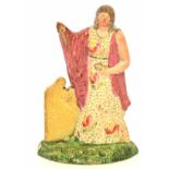 Late 19th century Staffordshire figure, perhaps from MacBeth, modelled as a lady by a gravestone