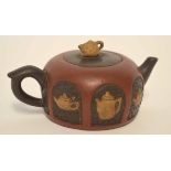 Chinese red ware teapot and cover, the body decorated with tea and coffee pot motifs, the cover with