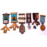 Six various silver, silver gilt and base metal Masonic jewels including Caernarvon Lodge (6)