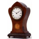 Mid-20th century mahogany and boxwood line inlaid timepiece, the shaped and waisted case raised on