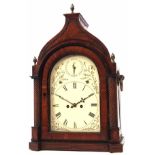 Late 19th century mahogany and ebonised mantel clock, the arched case surmounted by three acorn