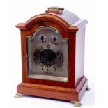 Early 20th century walnut cased triple spring barrel bracket clock, Junghans, the arched case with