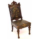 Late 19th century Gothic style chair, heavily embossed original leather seat and back