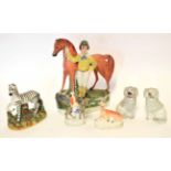 Collection of Staffordshire pottery animals and figures including a Zebra, two Poodles and a
