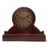 Early 20th century mahogany cased single fusee timepiece, the drum shaped case on a scrolling plinth