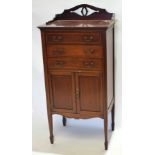 Edwardian mahogany music cabinet, raised pierced pediment over three full width drawers with fall