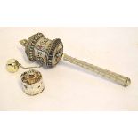 Oriental silver metal prayer wheel containing scroll, 22cm long