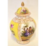 Continental porcelain vase and cover decorated in Meissen style with panels of floral sprays and