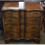 Reproduction serpentine fronted chest of four graduated drawers on bracket feet, 84cm wide