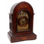 Early 20th century German walnut and inlaid triple spring barrel mantel clock, Junghans, the