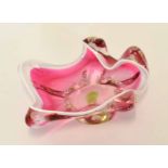 Murano glass shaped bowl with streaked design in cranberry with a white border, paper label to base,