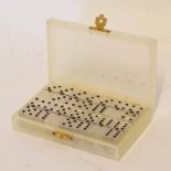 Cased set of miniature dominoes